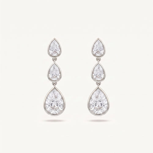 Graduated Pear Diamond Drop Earrings bezel-set pears in white gold