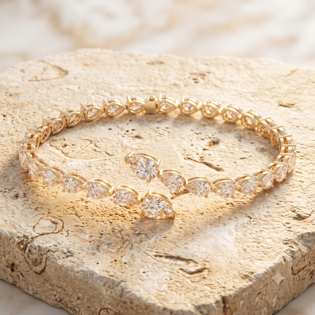 Leah's Bangle in 14k yellow gold on Jerusalem stone in golden-hour light