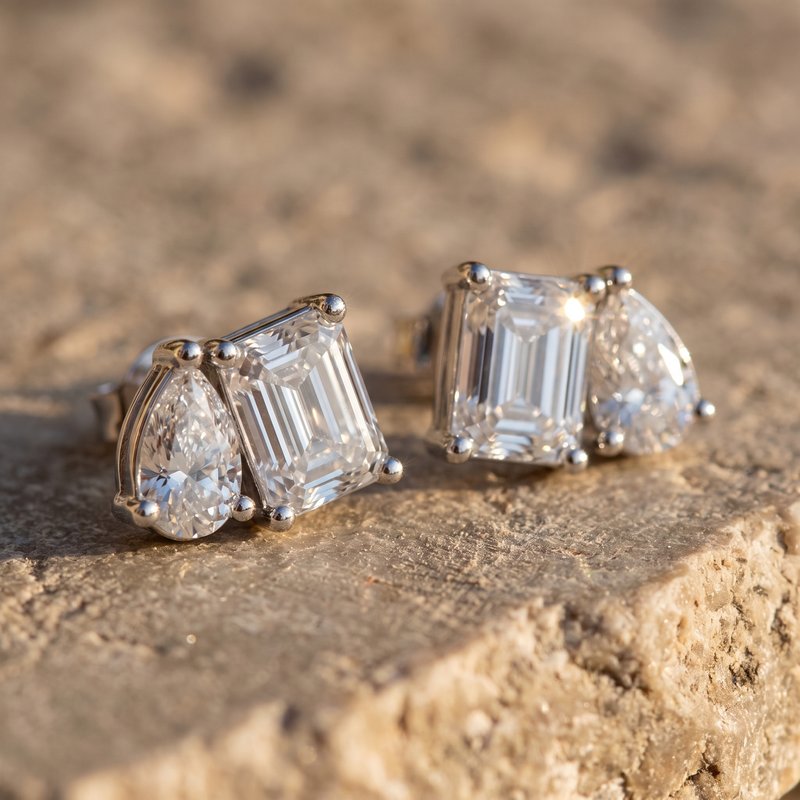Pear and emerald-cut toi et moi diamond studs in 14k white gold on Jerusalem stone