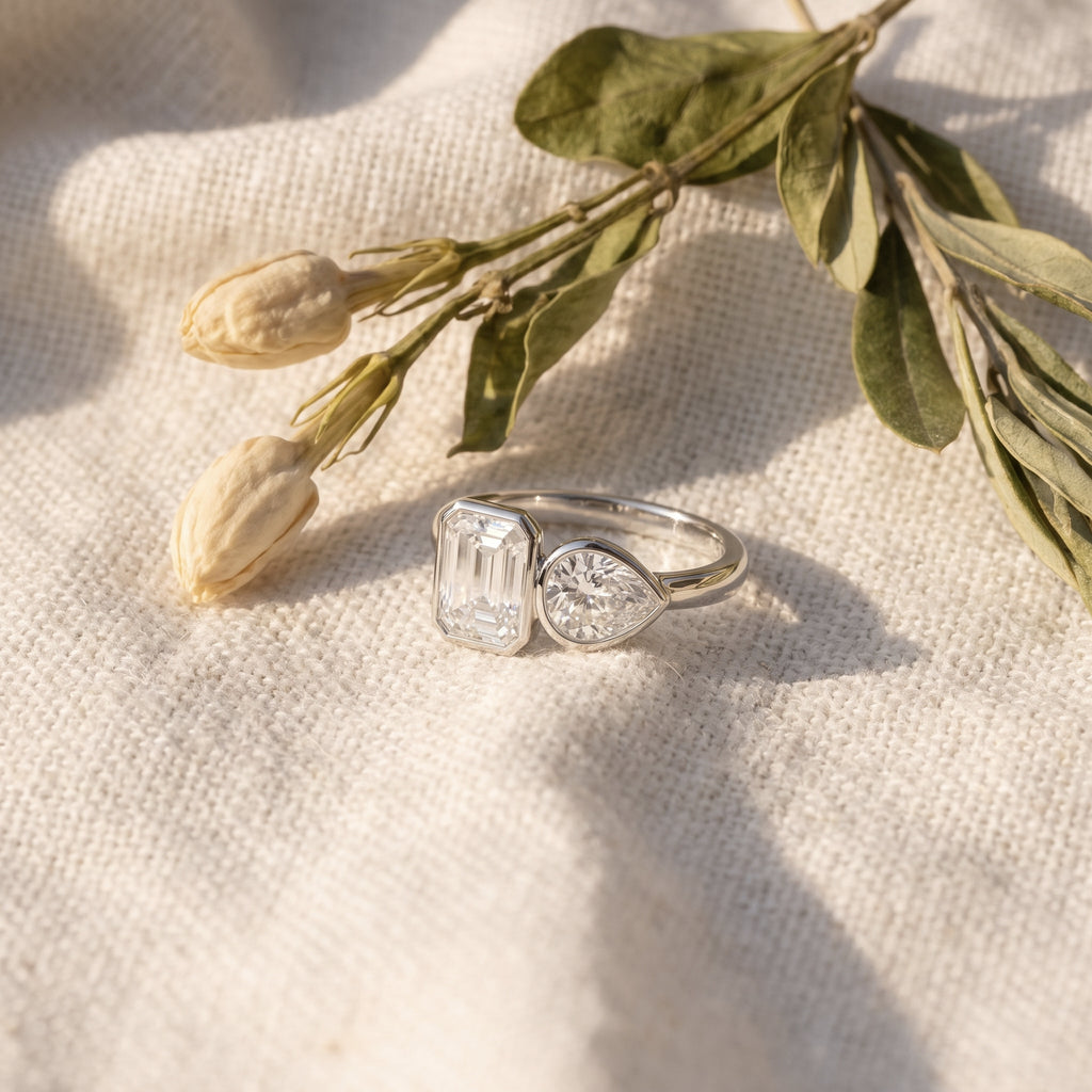 Rachel's Vow Ring on oatmeal linen with dried tulip buds and olive leaves