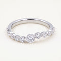 Rebecca's Wave Ring graduated round diamond band in white gold