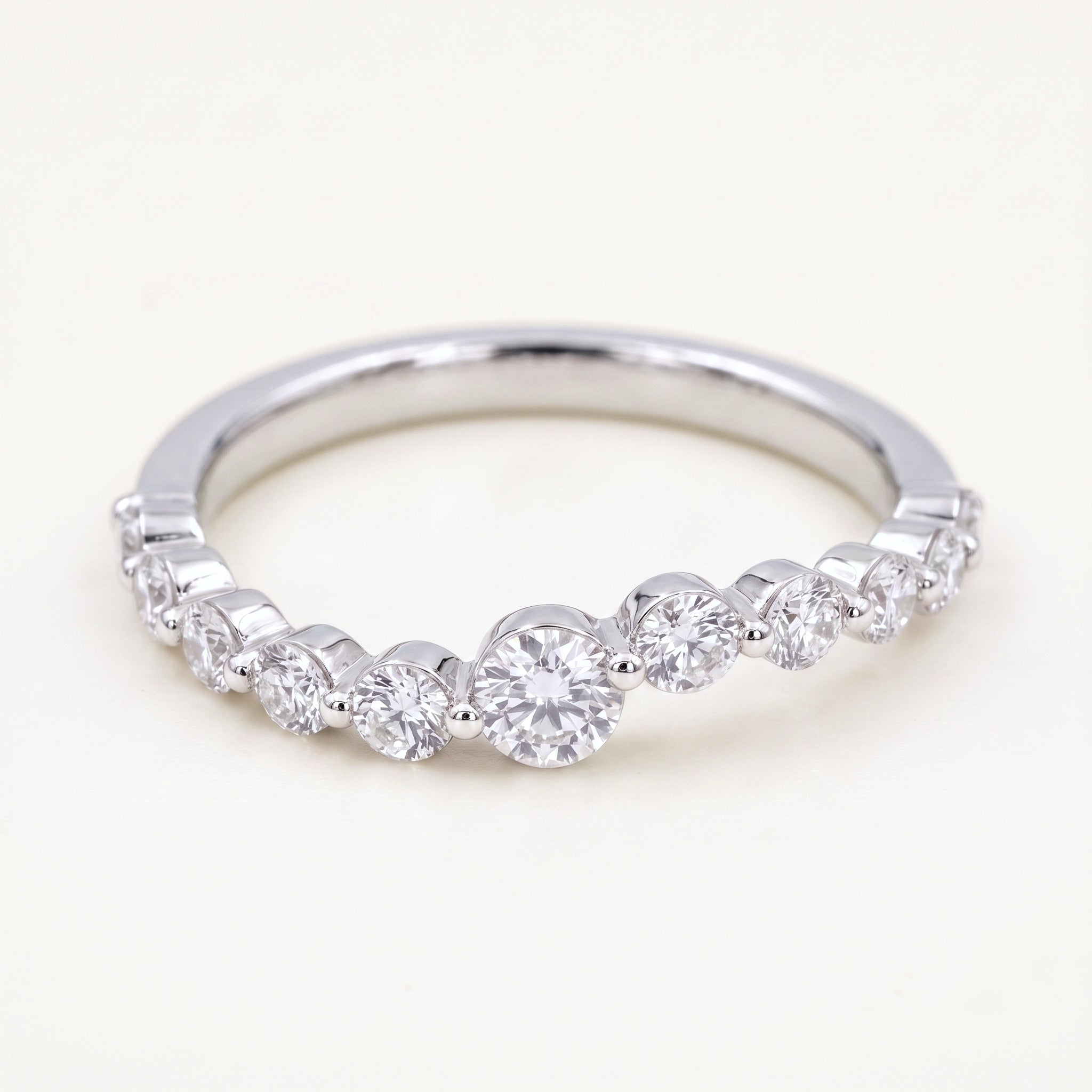 Rebecca's Wave Ring graduated round diamond band in white gold
