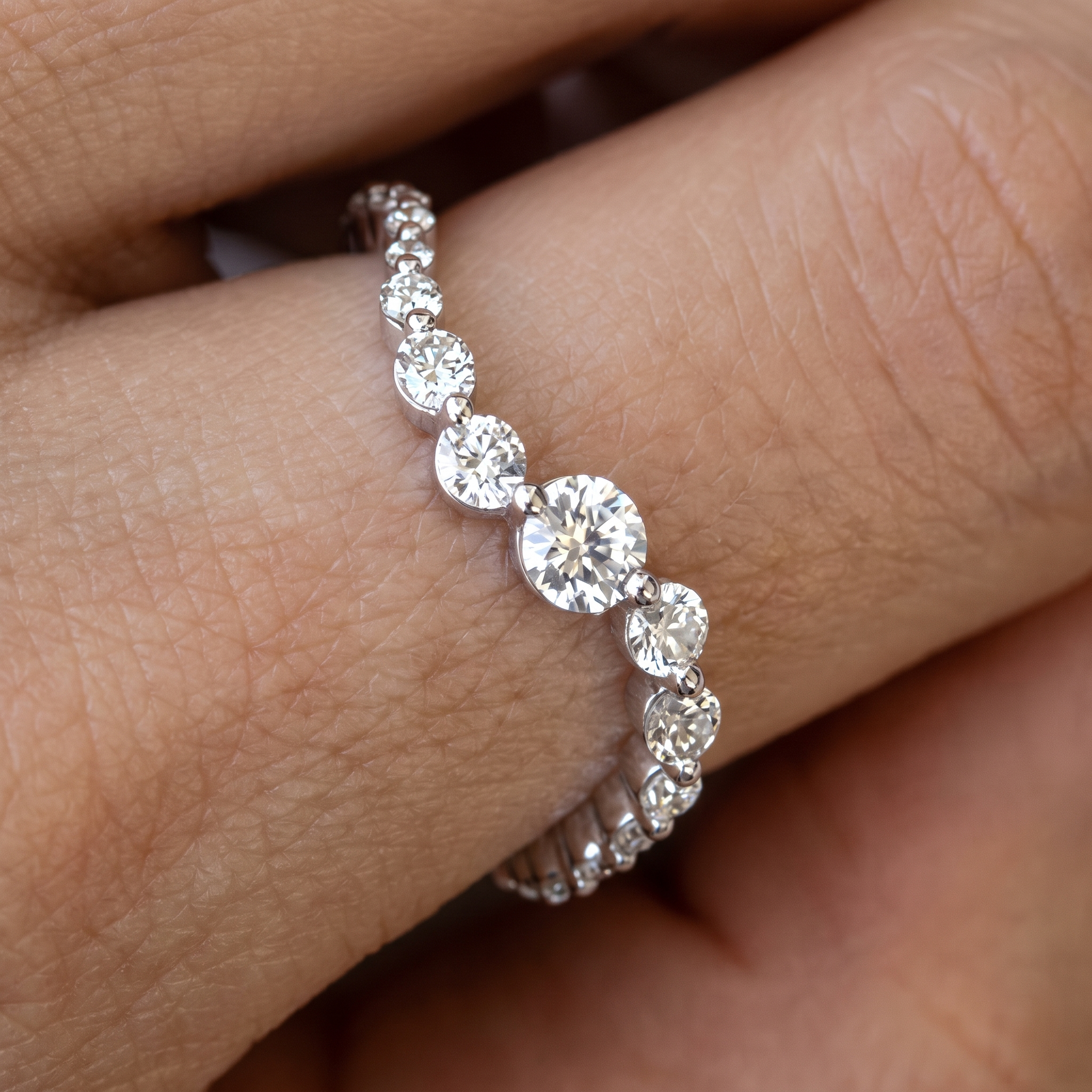 Rebecca's Water graduated diamond band worn on hand