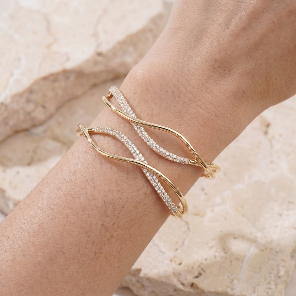 Rebecca's Wave pavé cuff worn on wrist