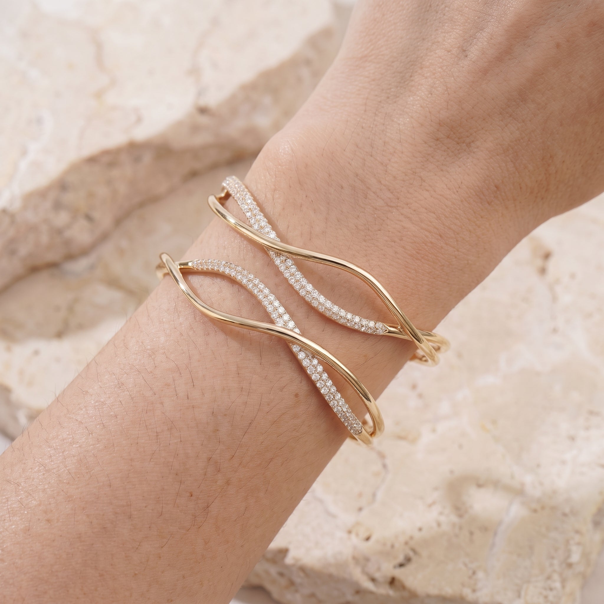Rebecca's Wave pavé cuff worn on wrist