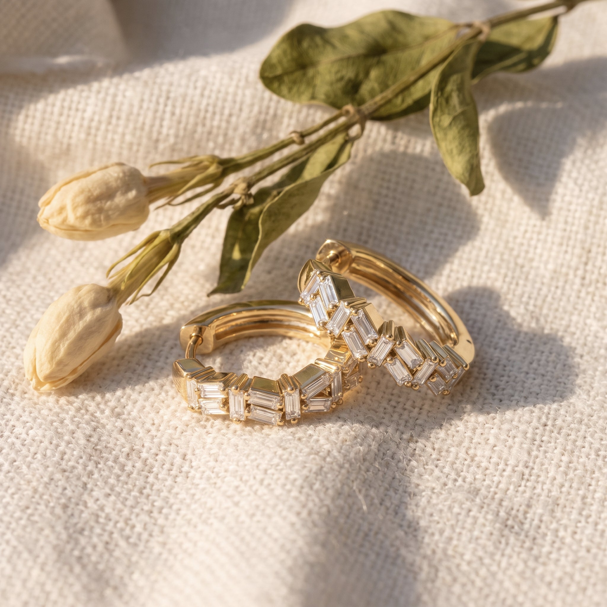 Sarah's Ember hoops on oatmeal linen with dried tulip buds and olive leaves