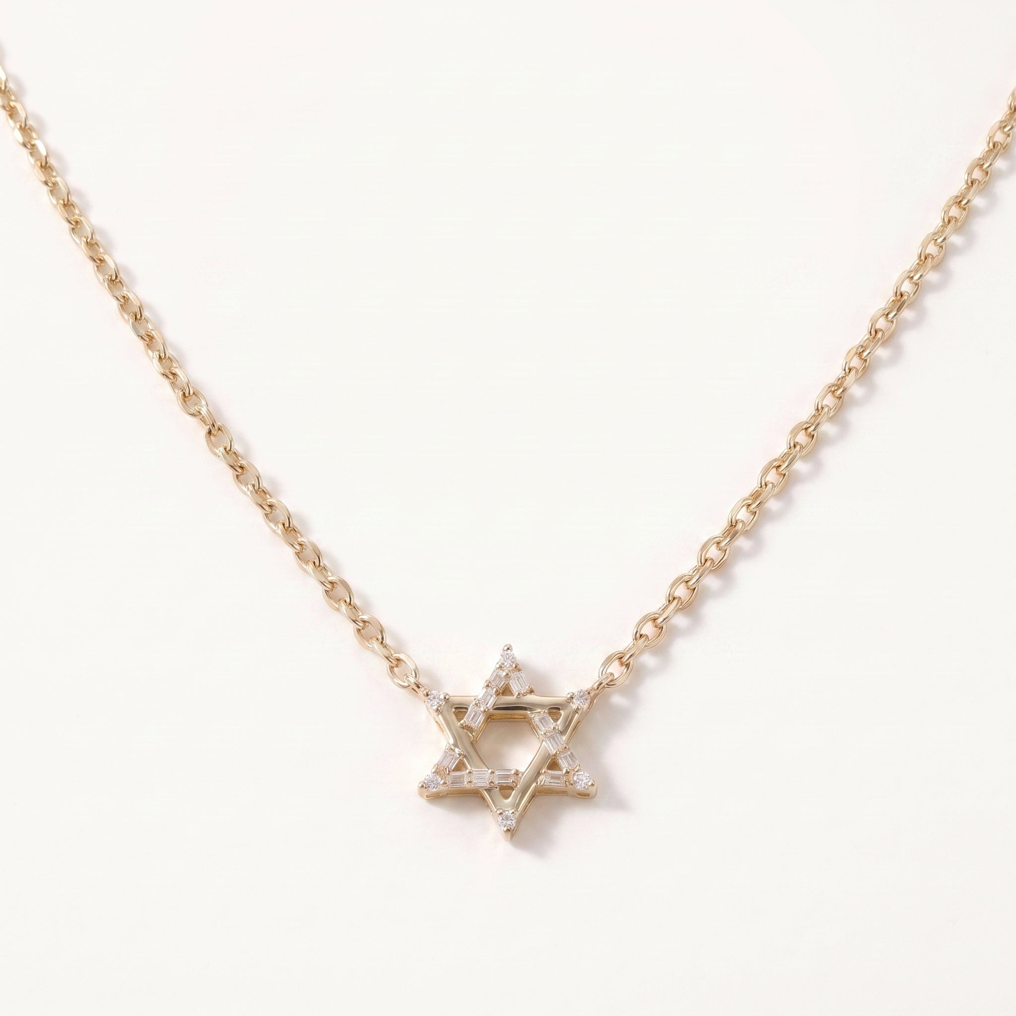 The Magen David Necklace baguette diamond Star of David pendant in 14k gold